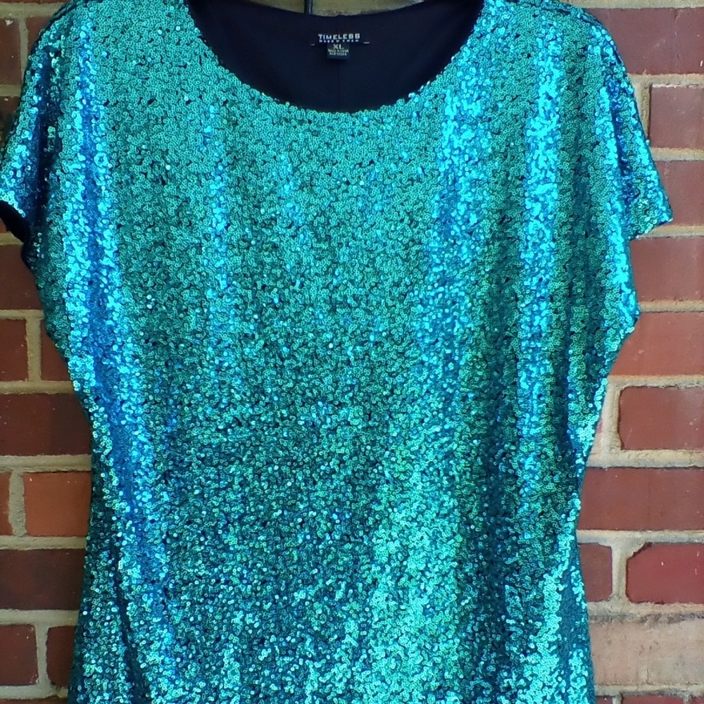 TIMELESS TOP